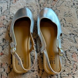 Never worn adorable silver sling backs!